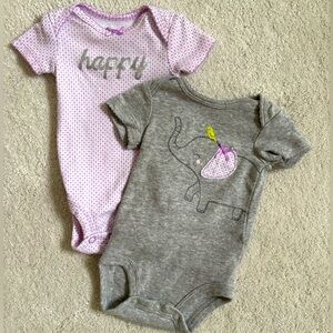 Newborn short sleeve onesies.  Minimally worn.